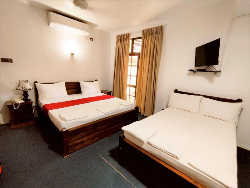 Deluxe Triple Room image 1