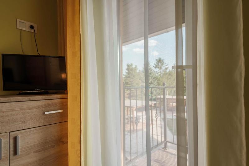 Family Room with Balcony image 1
