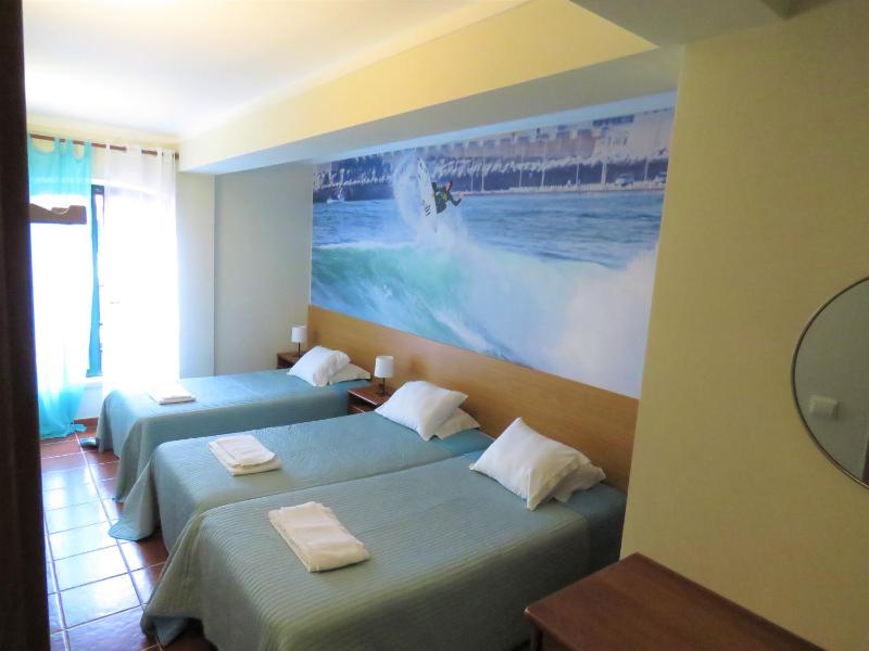Basic Triple Room with Shared Bathroom image 2