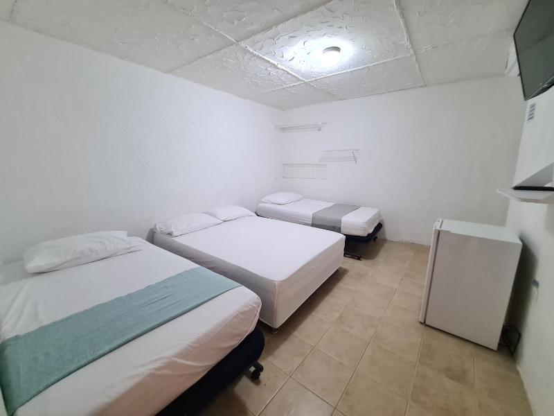 Quadruple Room with Private Bathroom image 1
