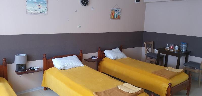 Economy Quadruple Room with Shared Bathroom image 4