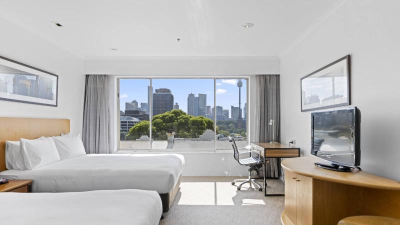 Premium Queen Room with Two Queen Beds and City View image 3