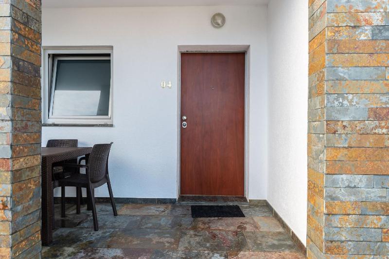 Studio Apartment with Balcony - Lower Floor image 2