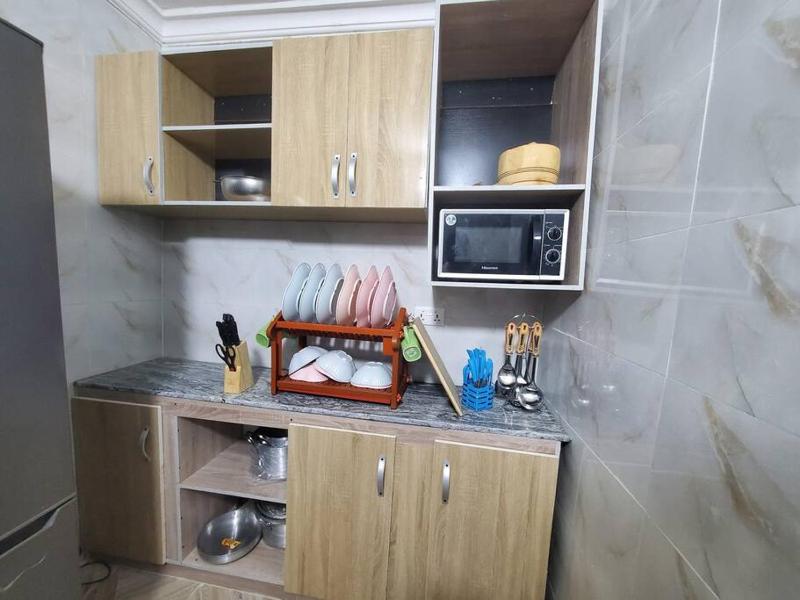 Spacious 2-bed Apt With 24hrs Power+ Unlimited Wi-Fi - image 13