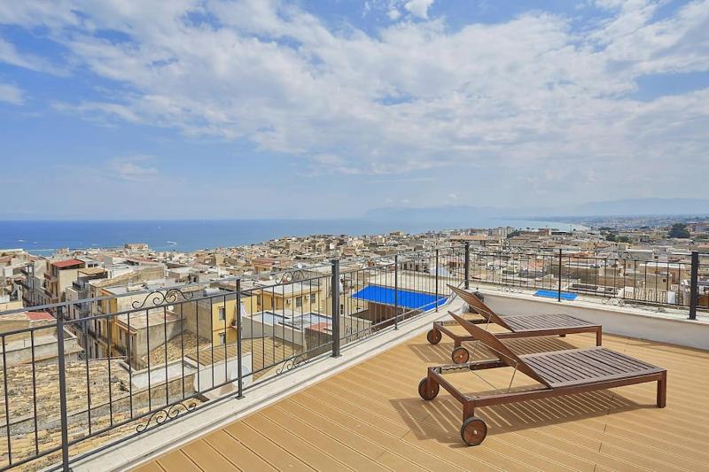 Ancient penthouse with splendid views of the sea Images