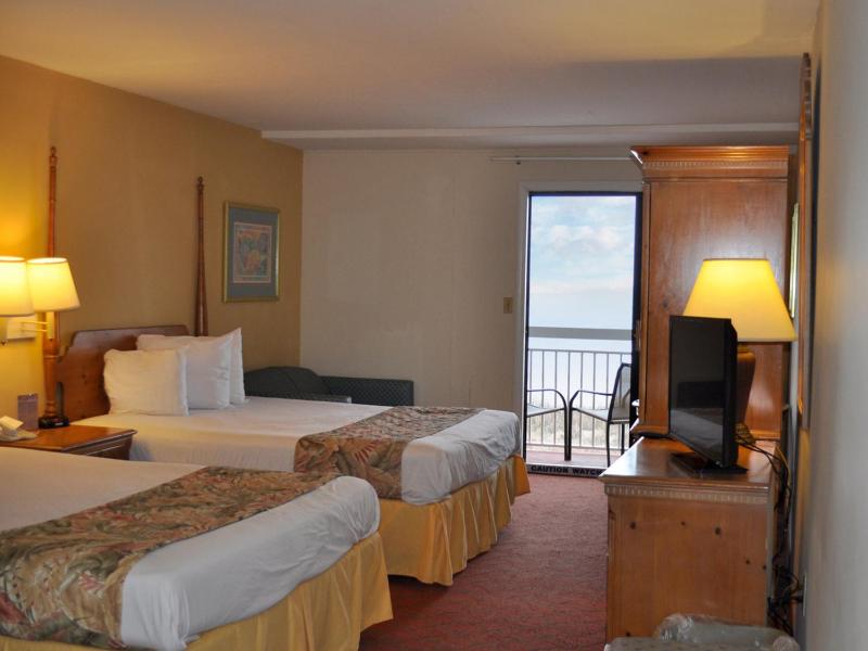 Side View with Two Queen Beds Kitchenette image 1