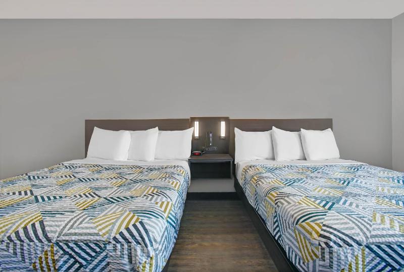 Deluxe Queen Room with Two Queen Beds image 2