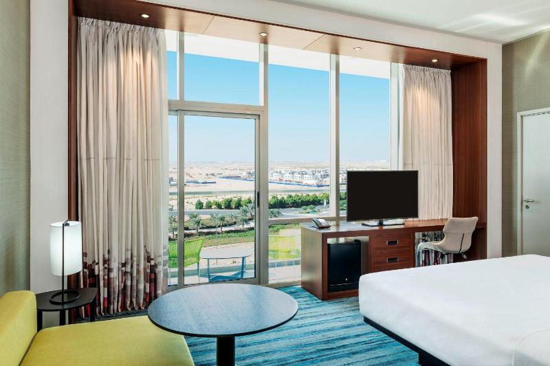 Savvy Suite – King Bed (Living Room + Two Bathrooms + Complimentary Shuttle to Expo Metro Station & Al Maktoum International Airport) image 2