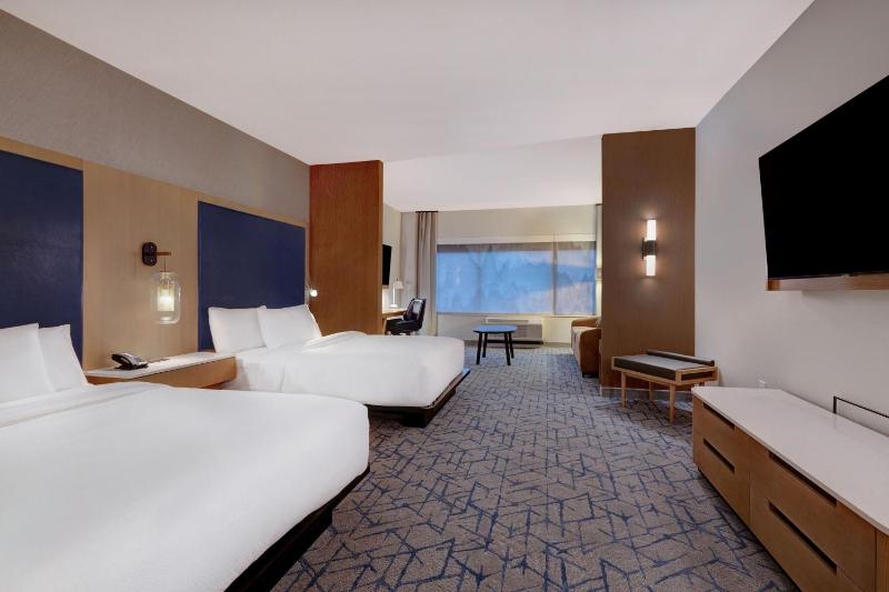Queen Suite with Two Queen Beds and Sofa Bed image 2