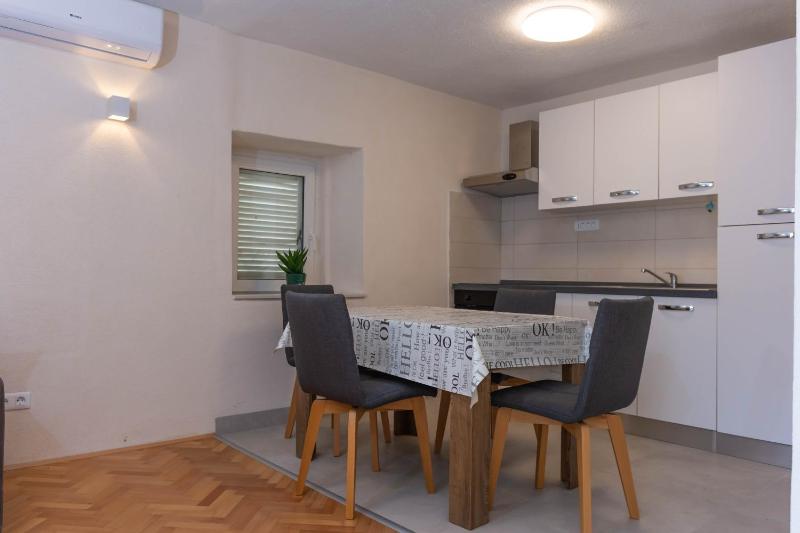 Apartments by the sea Kastel Novi Kastela - 21006 - image 2