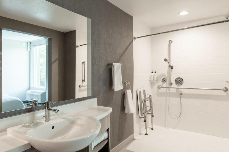 King Suite with Trundle Bed, Mobility and Hearing Accessible Roll-In Shower image 2