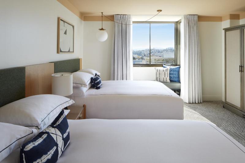Essential Queen Room with Two Queen Beds and City View image 3