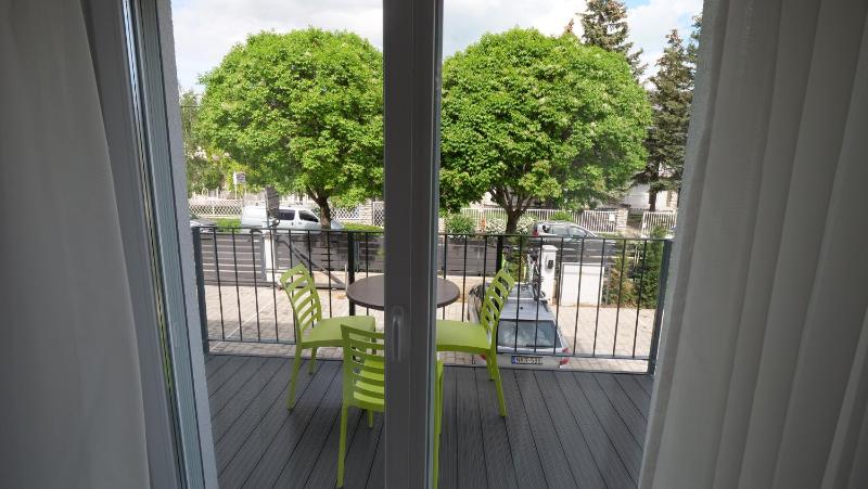Family Room with Balcony image 1