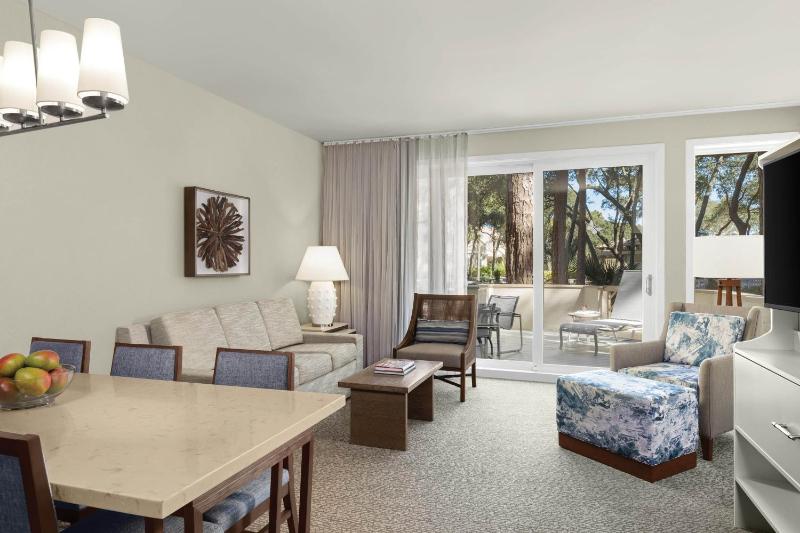 Two-Bedroom Villa with One King Bed, Two Twin Beds, Sofa Bed, Balcony and Garden View image 1