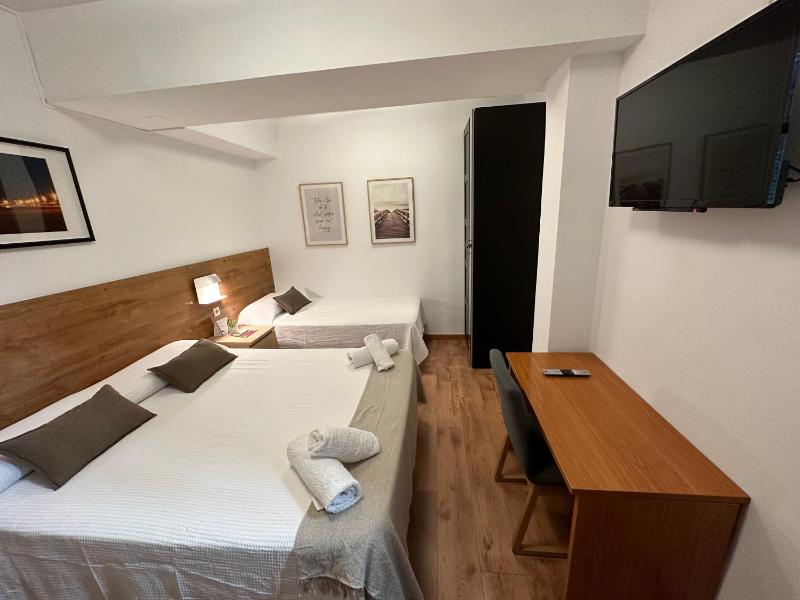 Triple Room with Private Bathroom image 1