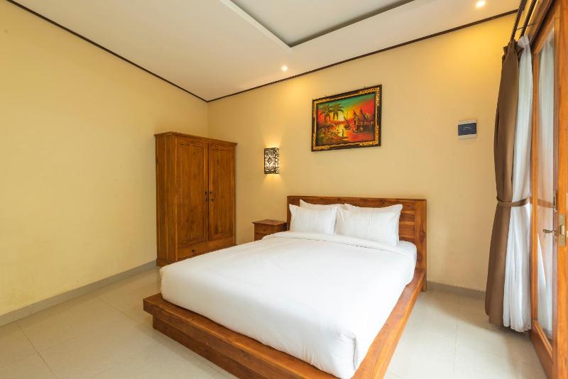 Liliy Guest House Kuta - image 4