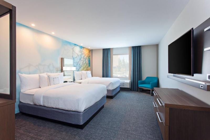 Queen Room with Two Queen Beds and Sofa Bed image 2