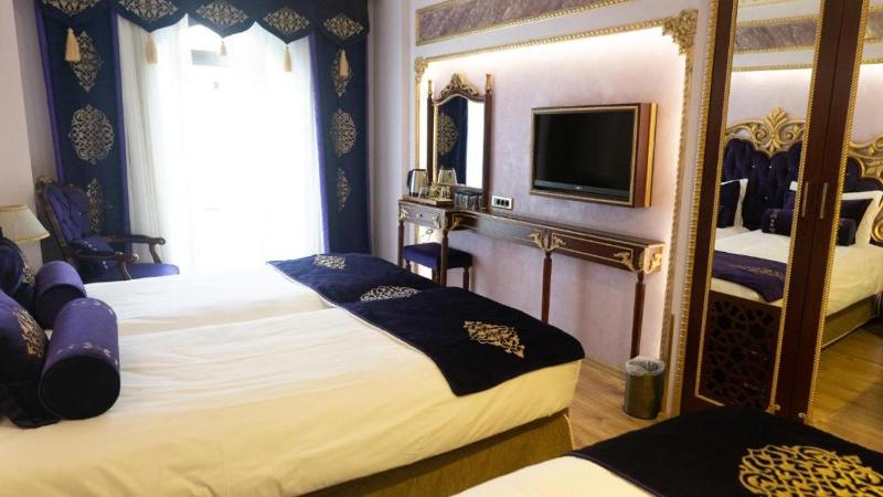 Deluxe Triple Room image 3