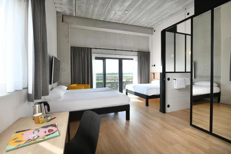 Standard Room with One Double Bed and Two Single Beds image 2