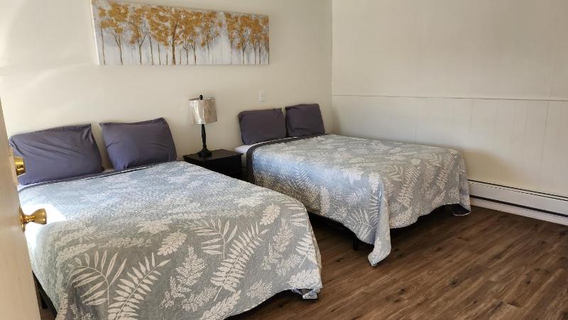 Deluxe Queen Room with Two Queen Beds image 1