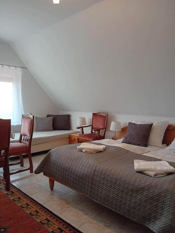 Quadruple Room with Private Bathroom image 2