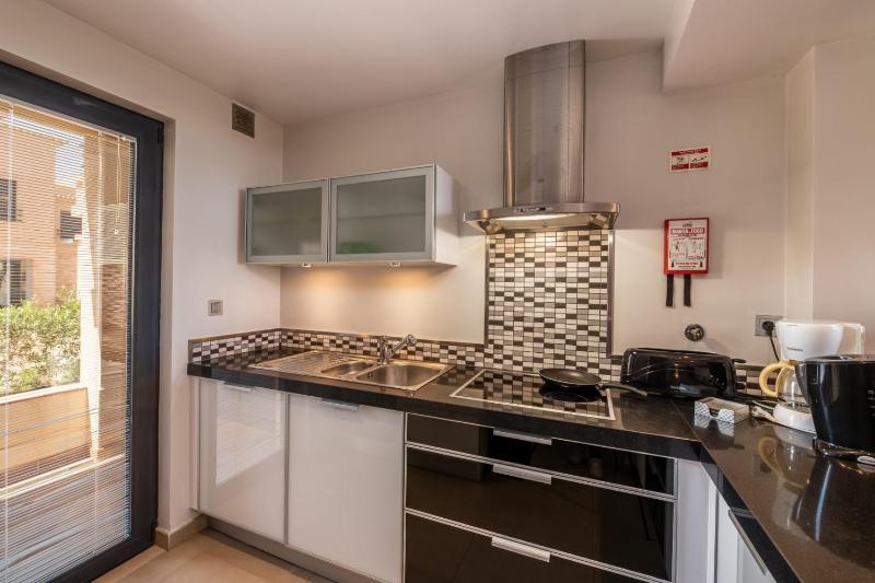 Three-Bedroom Apartment with Pool and Garden image 4