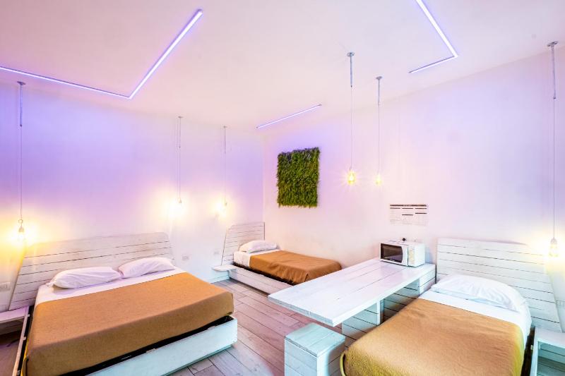 Luxury Quadruple Room with Balcony  image 2