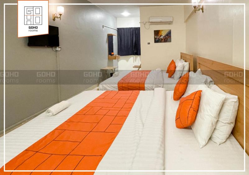 Deluxe Quadruple Room image 1