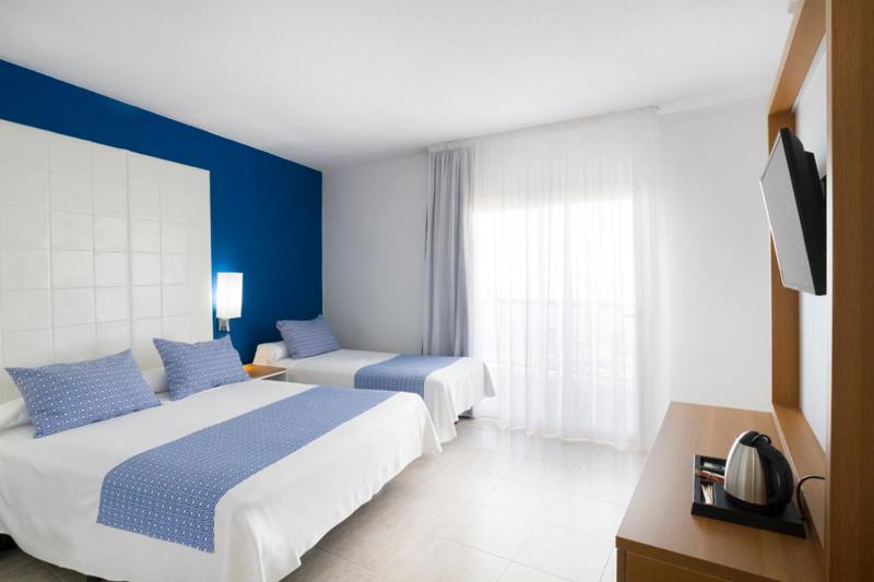Standard Triple Room with Partial Sea View image 1