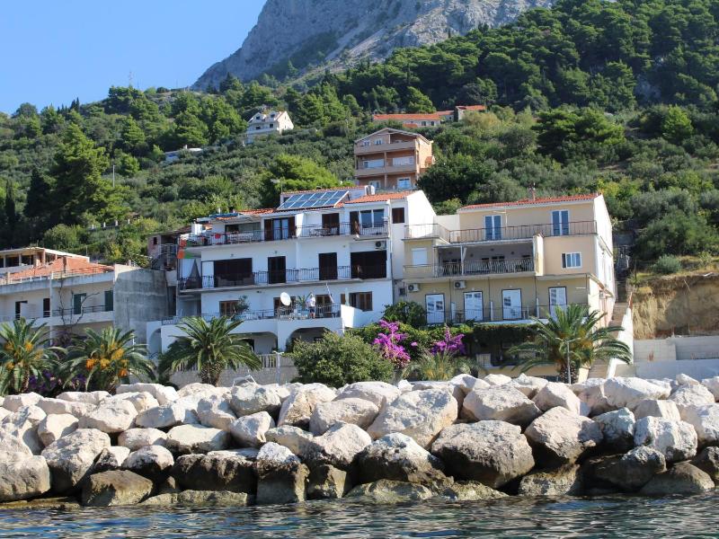 Apartments by the sea Podgora Makarska - 21378 - image 1