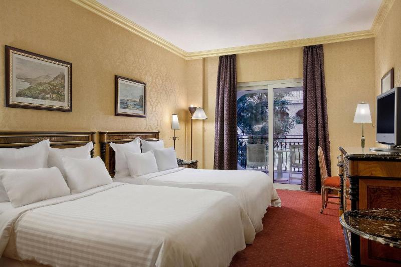 Queen Room with Two Queen Beds and Balcony image 2