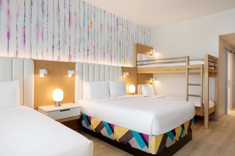 Queen Room with Two Queen Beds and Bunk Beds image 4