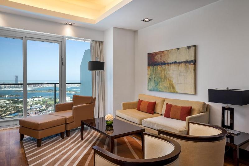 Premier One Bedroom Sea View Apartment - Complimentary Transfer to Mall of the Emirates, Insurance Market Metro Station & Jumeirah Beach image 4