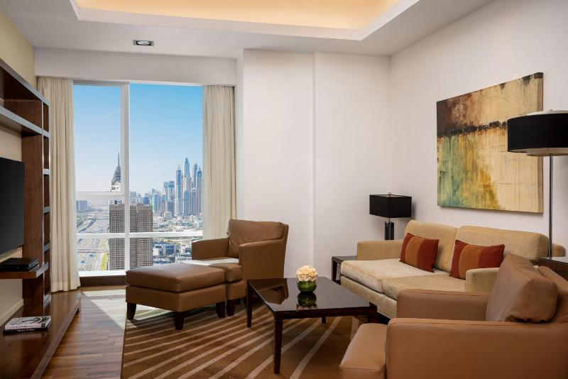 Deluxe Two Bedroom Apartment - Complimentary Transfer to Mall of the Emirates, Insurance Market Metro Station & Jumeirah Beach image 1