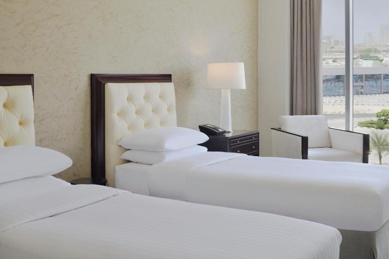 Executive Twin Room with Pantry Lounge Access and Shuttle Bus to JBR Beach and various shopping malls image 1