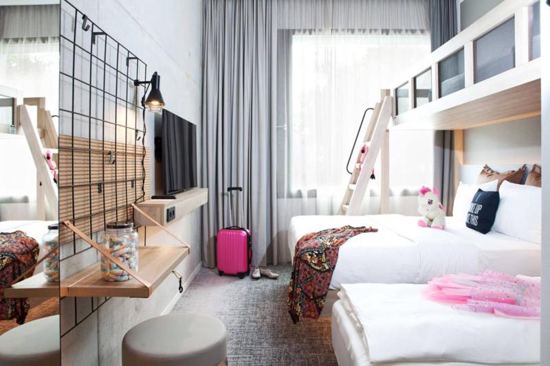 Moxy Family Room with 1 Queen, Sofa bed, Inland view image 1