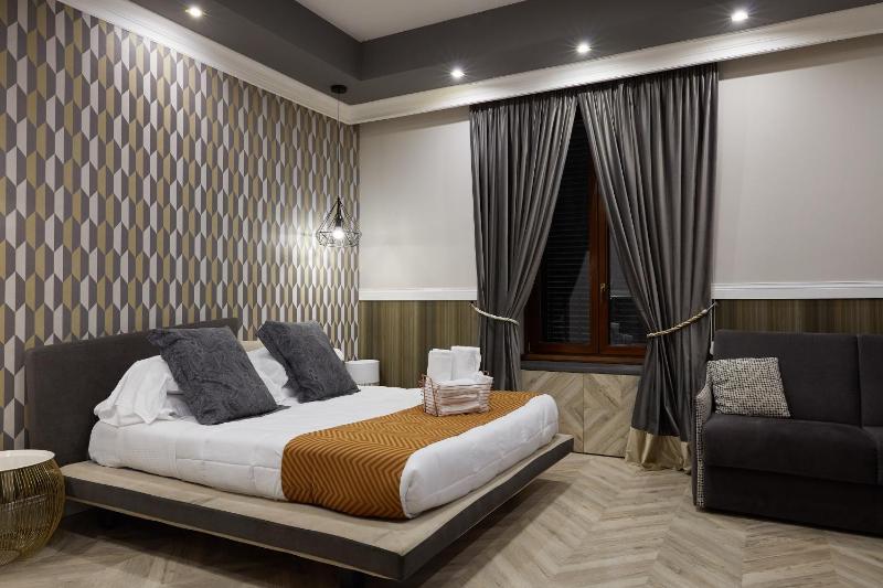 Deluxe Quadruple Room image 1