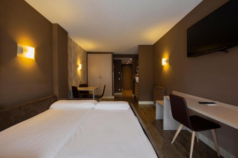 Quadruple Room (3 Adults + 1 Child) image 3