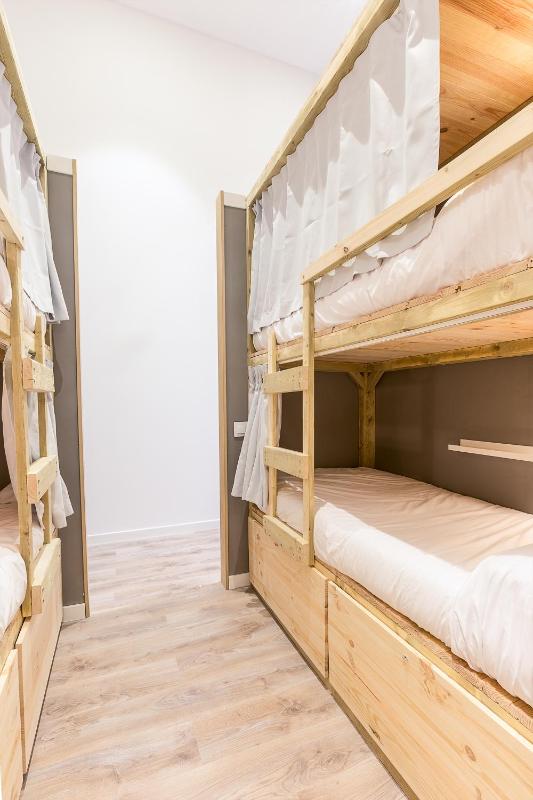 Bed in 4-Bed Mixed Dormitory Room with Private Bathroom image 1