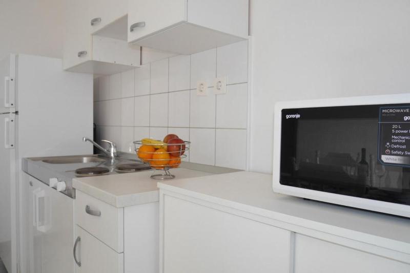 Apartment in Dugi Rat with sea view balcony air conditioning WiFi 5132-1 - image 26