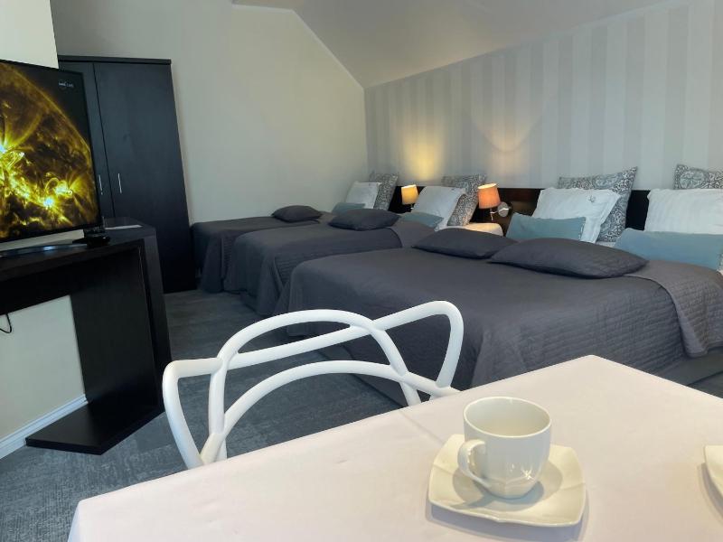 Quadruple Room with Kitchenette image 3