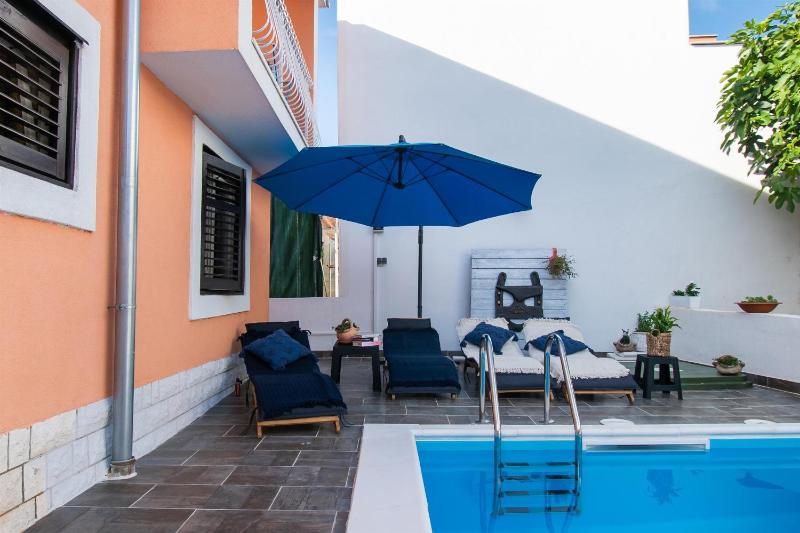 Apartments and Room Agiss with pool - image 20