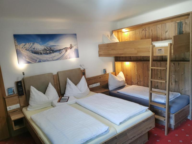 Budget Quadruple Room with Balcony and Mountain View image 1