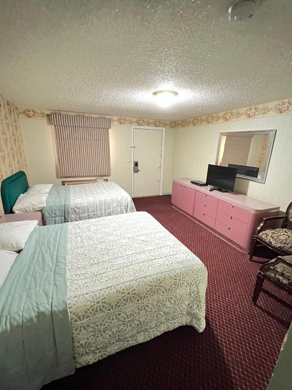 Deluxe Queen Room with Two Queen Beds image 1