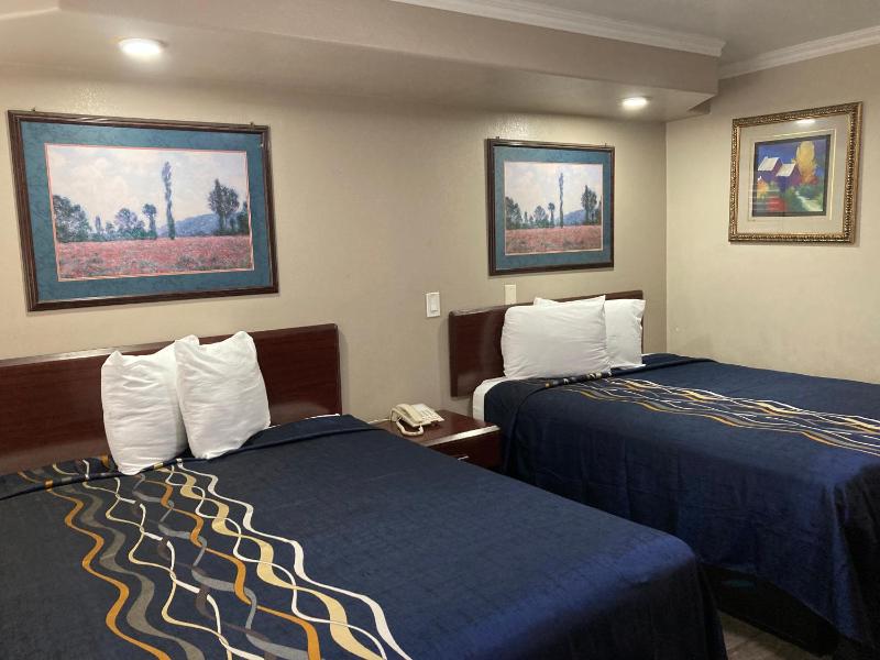 Deluxe Queen Room with Two Queen Beds image 1