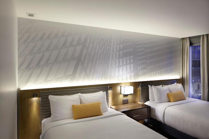 Standard Queen Room with Two Queen Beds image 2