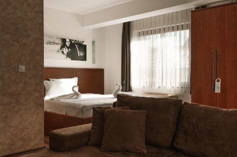 Suite with Balcony and City View image 1