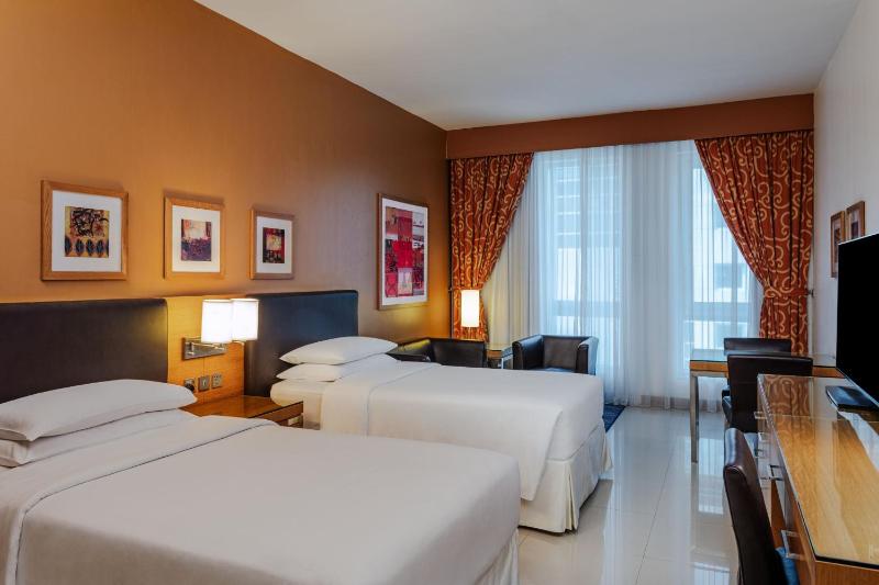 Classic Twin Room with complimentary shuttle service to Dubai Mall & Kite Beach