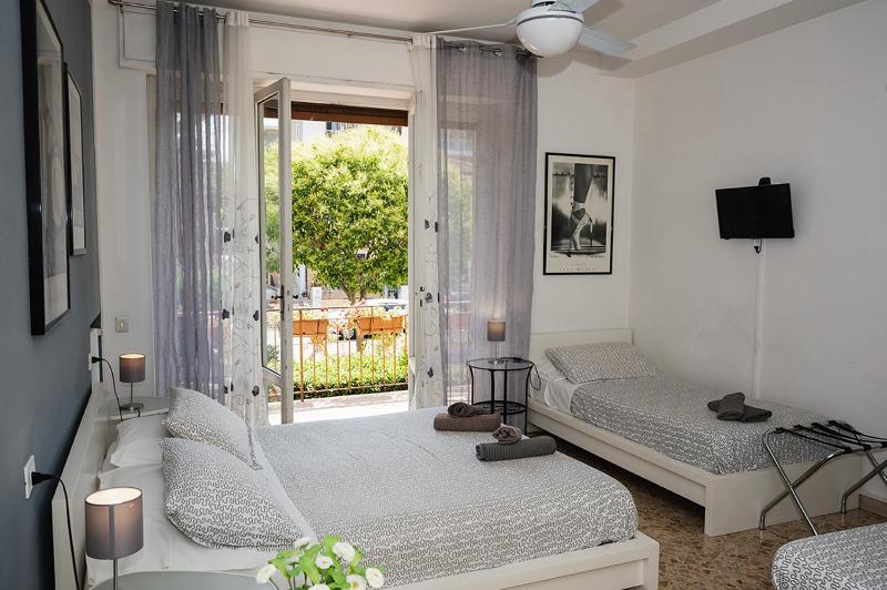 Quadruple Room with Private Bathroom image 1
