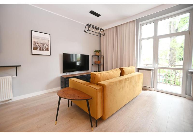 Victus Spacious Apartment Close to the Beach with a Work Space by Noclegi Renters - image 15